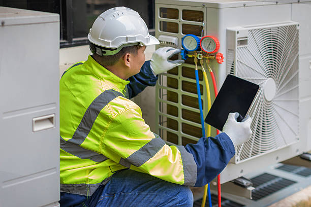 Professional Air Conditioning Repair technician working in La Crosse, KS